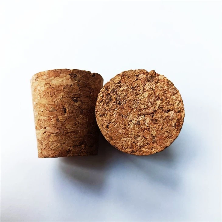 small glass bottles with cork stopper